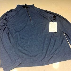 New with tags - men’s Lululemon 1/2 zip. Size Large